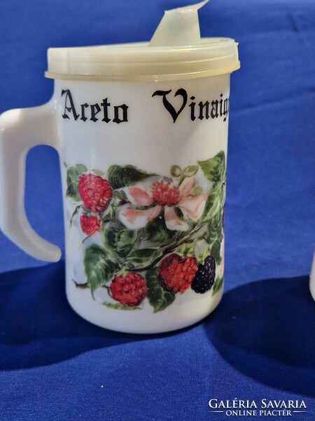 Oil and vinegar storage and pouring vessel made of white Jena glass, with strawberry and strawberry flower patterns.