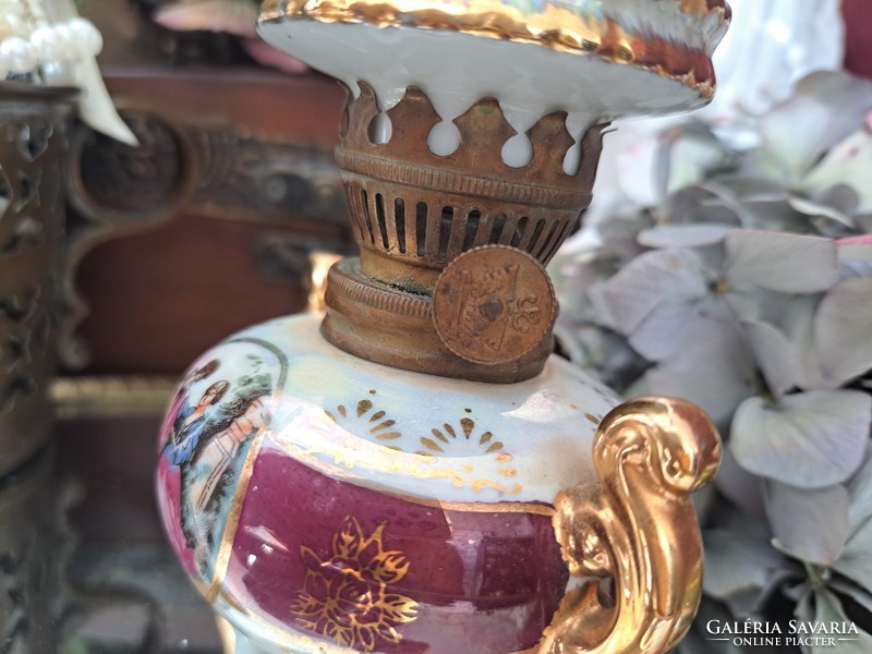Luster-glazed porcelain oil lamp.