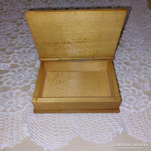 Carved wooden box decorated with a retro folk motif