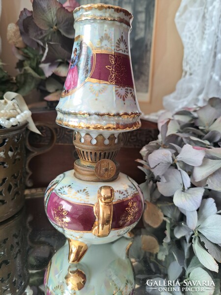 Luster-glazed porcelain oil lamp.