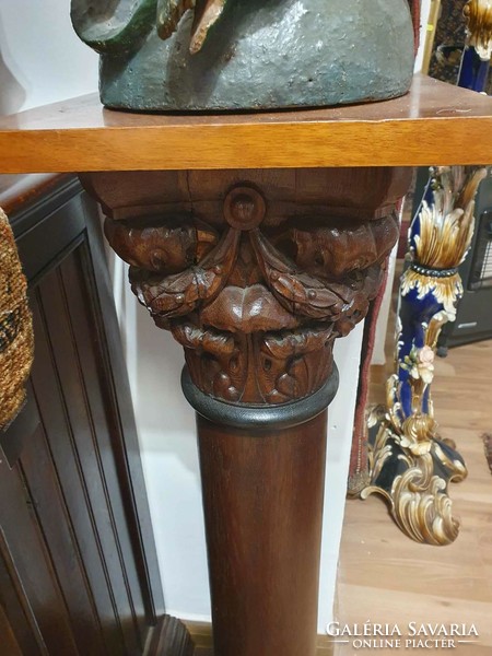 2 pedestals carved from solid wood. Very nice decorative pieces. They are 110 cm high