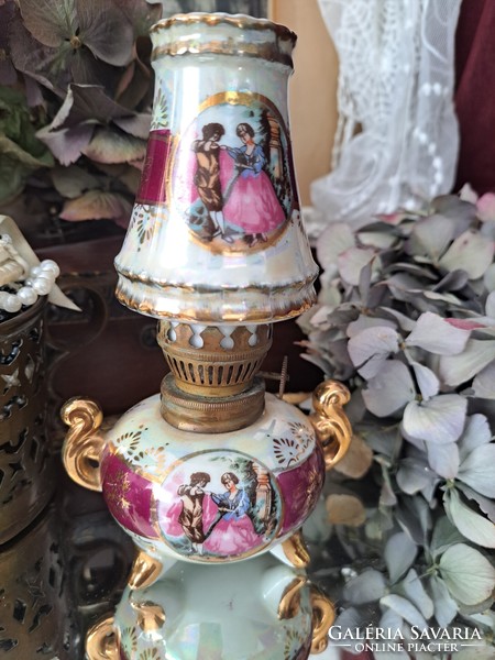 Luster-glazed porcelain oil lamp.