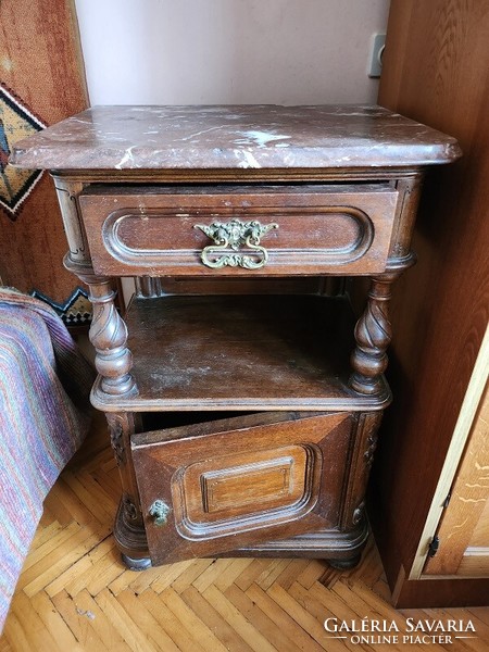 Two bedside tables with marble tops