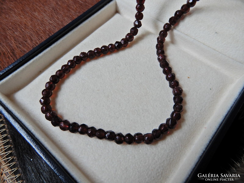 Antique faceted garnet string of pearls with 8 carat gold clasp