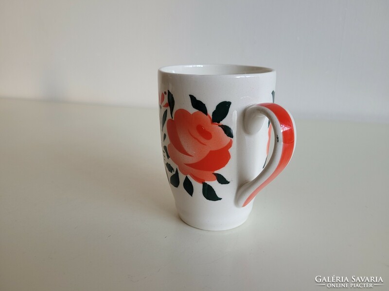 Old granite mug tea cup with rose pattern