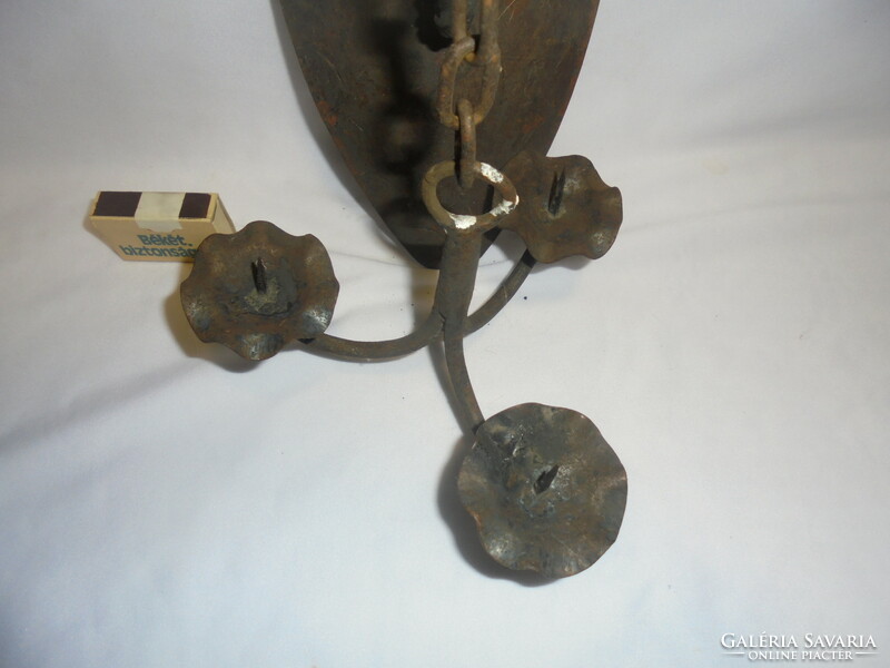 Old wrought iron wall sconce - anchor-shaped, three-pronged