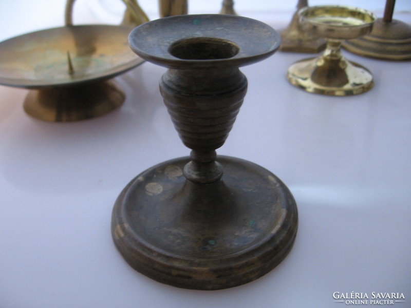 Old copper candle holder with patina