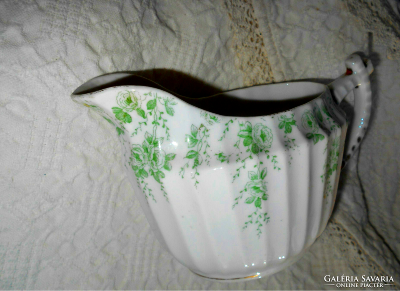 Porcelain pouring jug with ribbed surface