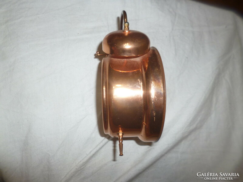 Old copper mechanical alarm clock alarm clock