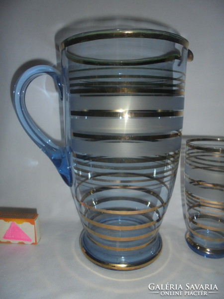 Old pale blue, richly gilt glass jug with three glasses