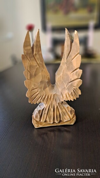 Carved bird statue