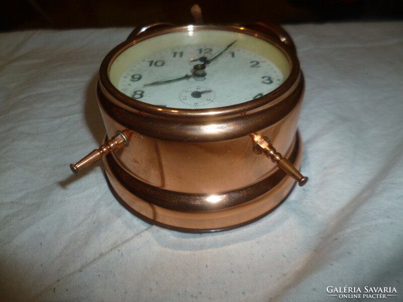 Old copper mechanical alarm clock alarm clock