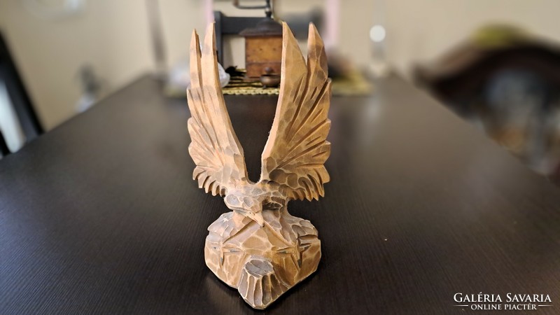 Carved bird statue