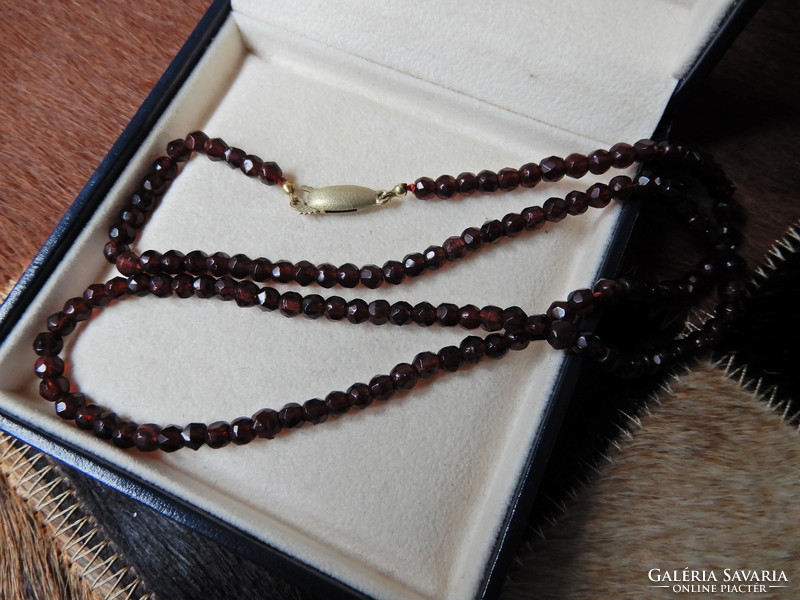 Antique faceted garnet string of pearls with 8 carat gold clasp