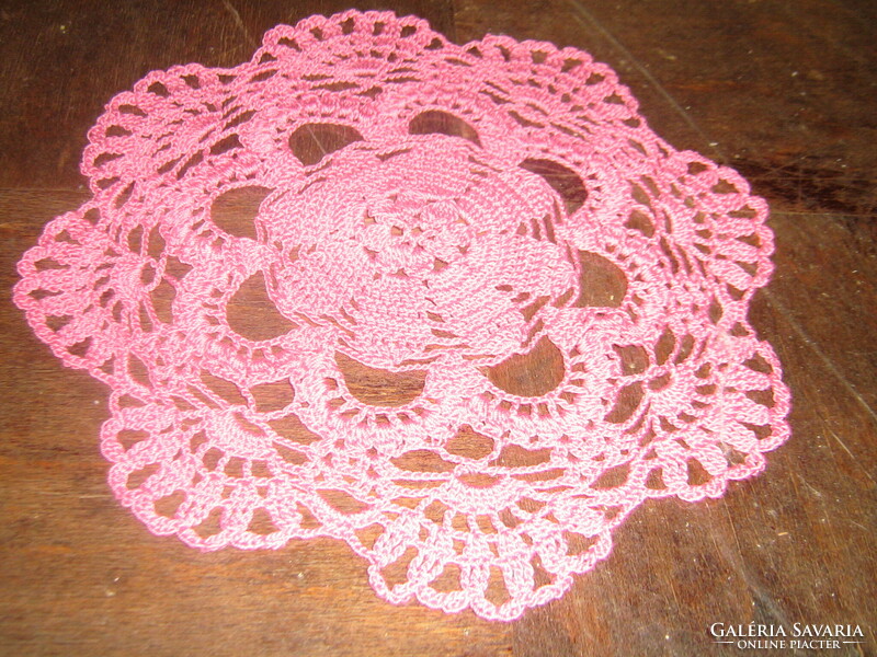 Cute pink hand crocheted round lace tablecloth