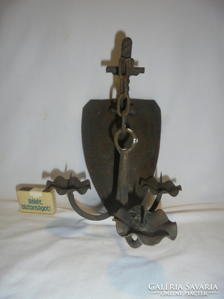 Old wrought iron wall sconce - anchor-shaped, three-pronged