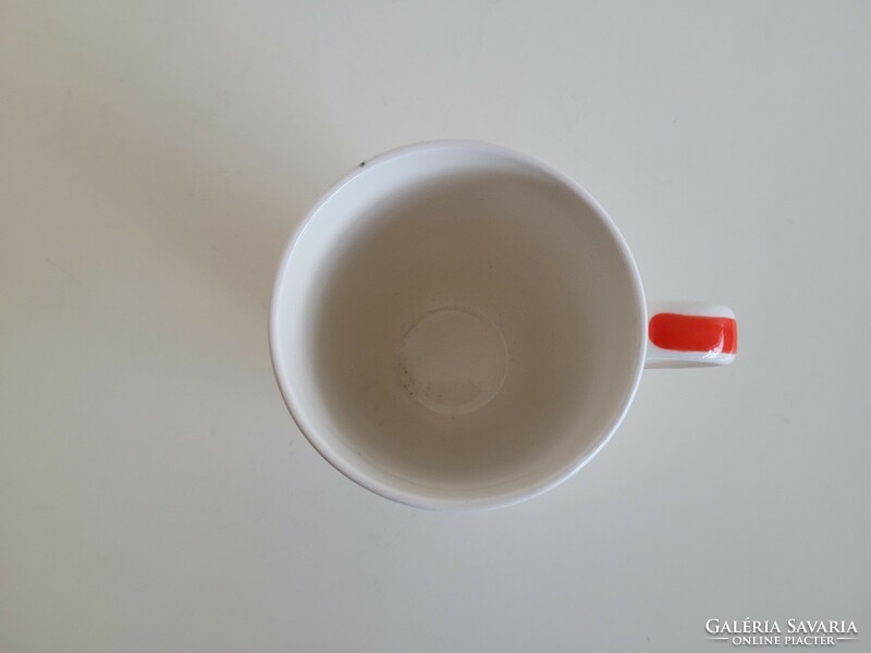 Old granite mug tea cup with rose pattern