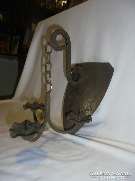 Old wrought iron wall sconce - anchor-shaped, three-pronged