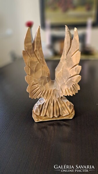 Carved bird statue