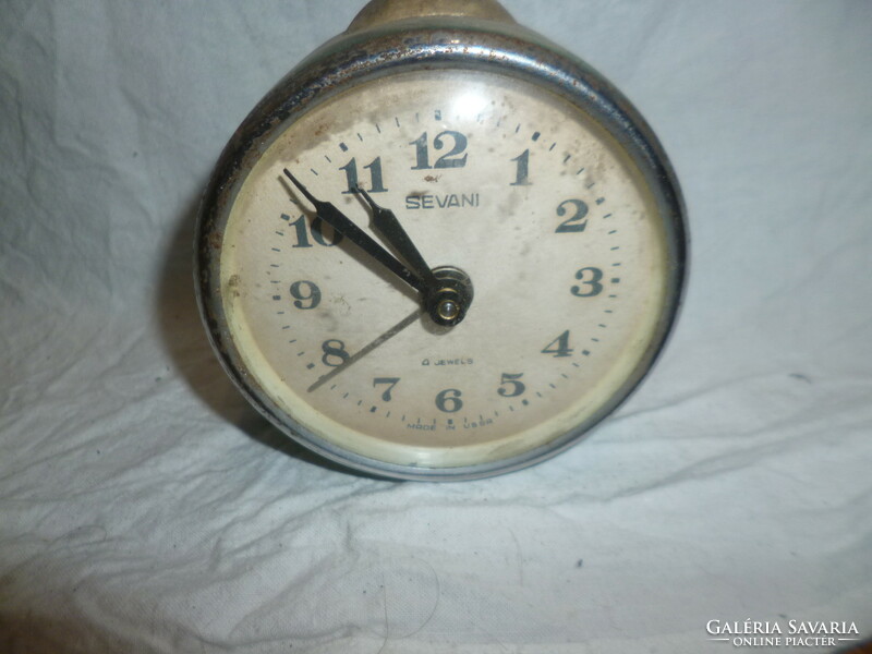 Old wind-up Soviet alarm clock alarm clock works