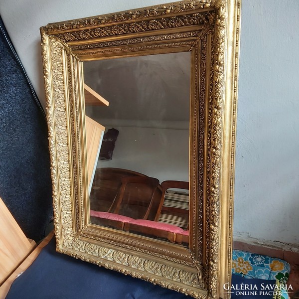 Antique picture frame with mirror.