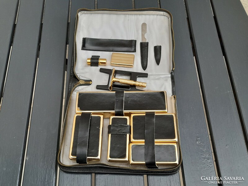 Old travel razor set in leather case