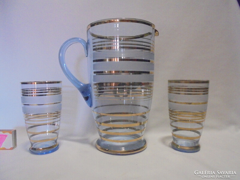 Old pale blue, richly gilt glass jug with three glasses