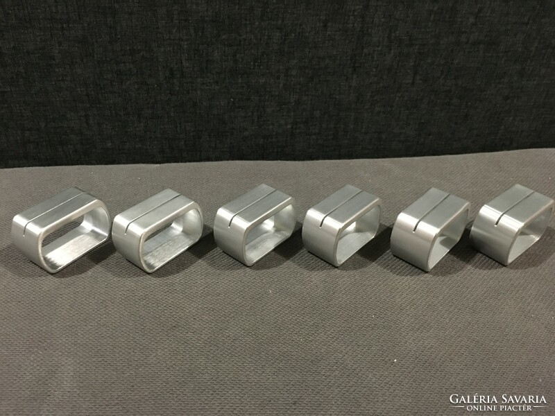 Six designer aluminum napkin rings!! 5X3x2.5cm!!