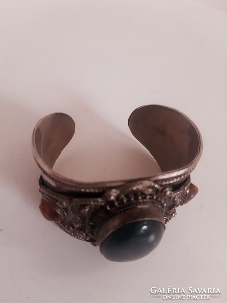 Women's bracelet and bangle studded with Far Eastern stones