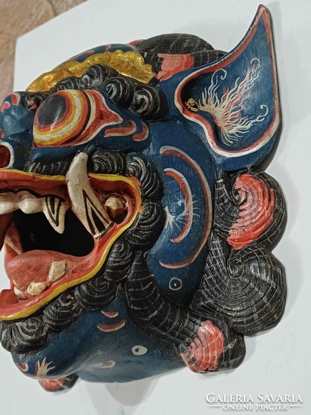 Old Indonesian wooden mask wall decoration