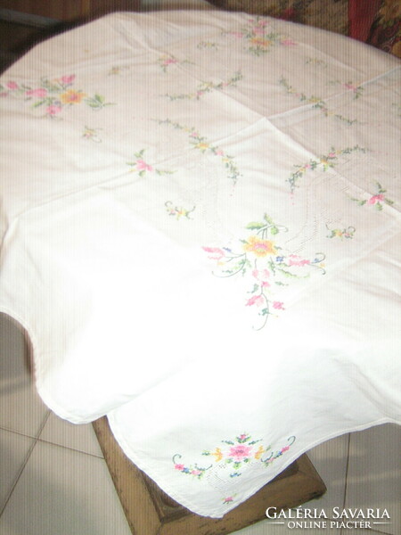 Wonderful cross-stitched floral tablecloth