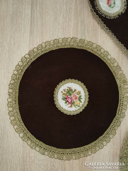 Brown velvet tablecloths with Gobelin overlay.