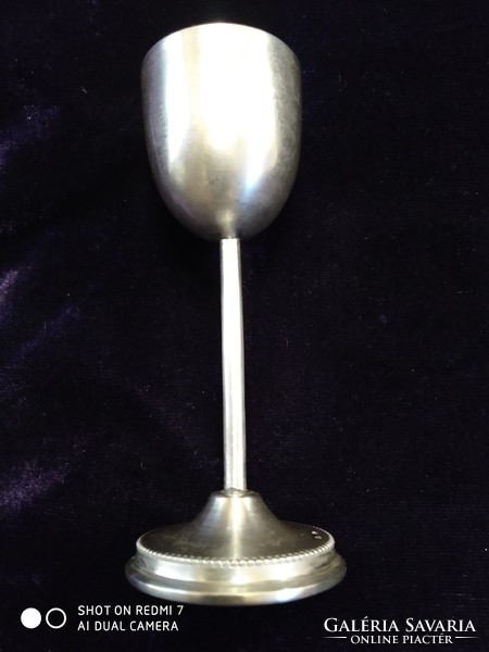 Silver (800 houndstooth) stemmed short drink glass.