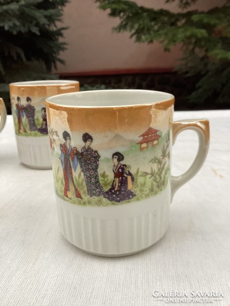 Zsolnay porcelain mug with an oriental geisha scene.