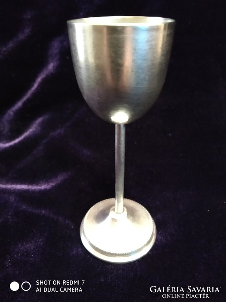 Silver (800 houndstooth) stemmed short drink glass.