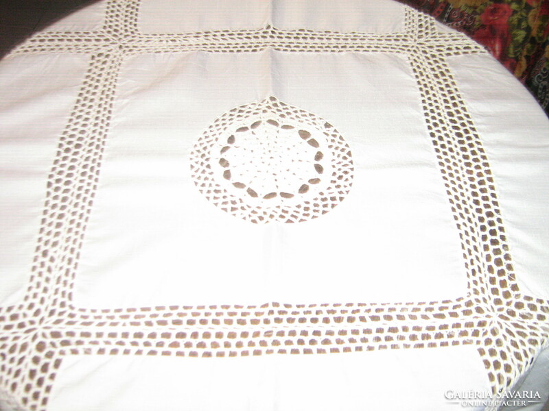 Elegant tablecloth with a beautiful hand-crocheted edge and crochet insert