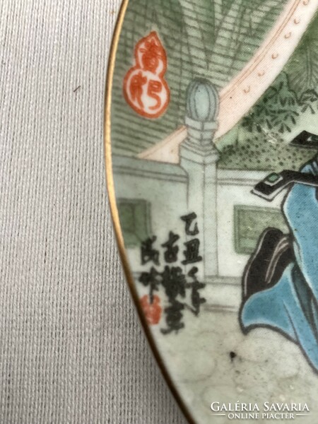 Oriental porcelain small plate 14 cm.