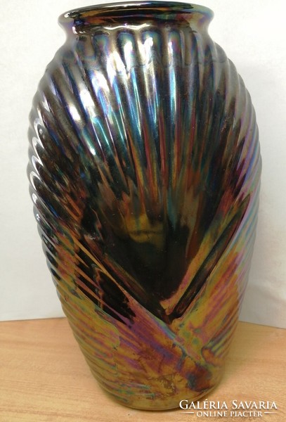 Modern applied art vase with iridescent eosin type glaze with a metallic effect. Idea