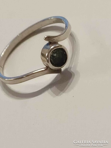 Silver ring with green stone