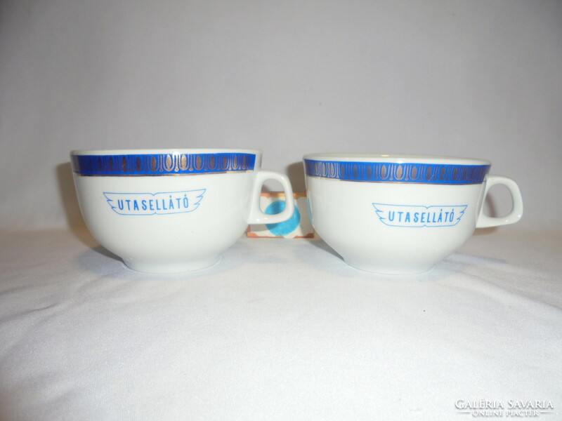 Two passenger soup cups - together