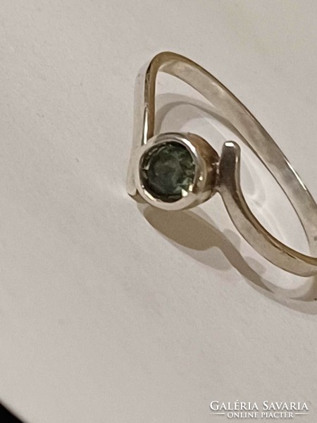 Silver ring with green stone