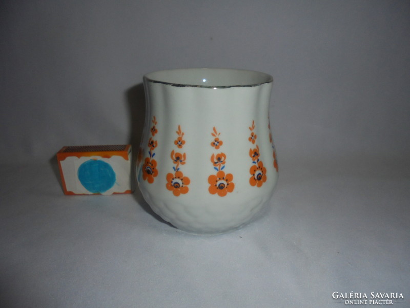 An old Zsolnay mug with a pot belly