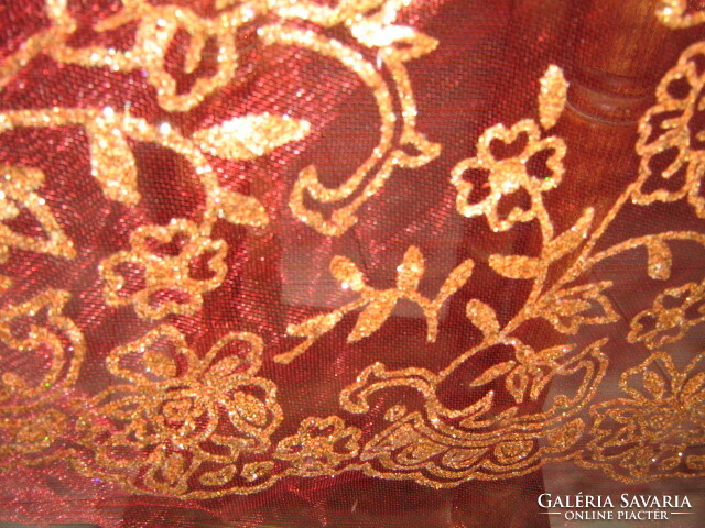 Round tulle tablecloth with a gold pattern in beautiful red material