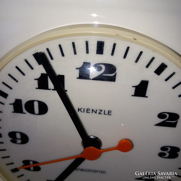 Numbered, German, ceramic wall clock. (Kienzle) (electronic).