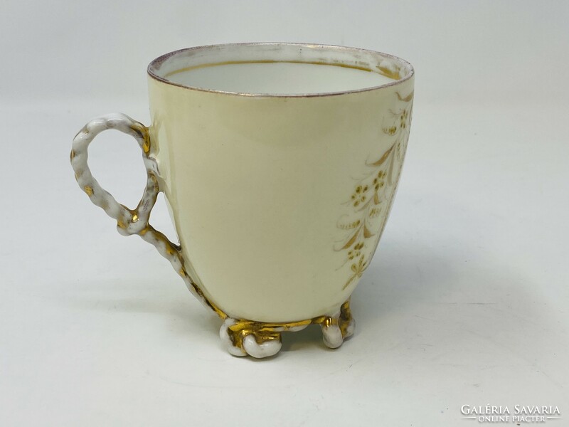 Antique porcelain cup with an unknown man's port, twisted handle and base, gilded decoration rz