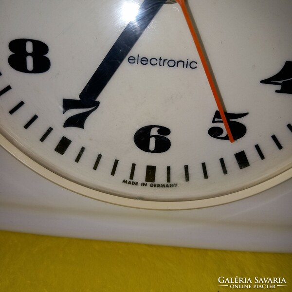 Numbered, German, ceramic wall clock. (Kienzle) (electronic).