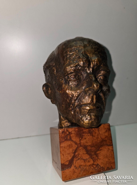 Bronze head on a marble base