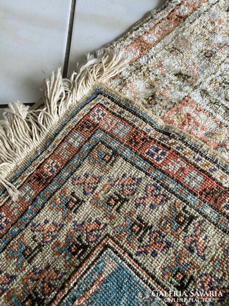 Small semi-antique handmade silk carpet 53x95