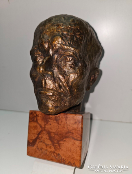 Bronze head on a marble base