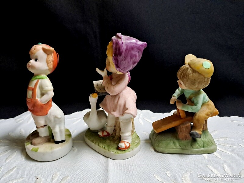 Little girl with a goose, little boy with a seesaw and a lamb, 3 pieces of biscuit porcelain